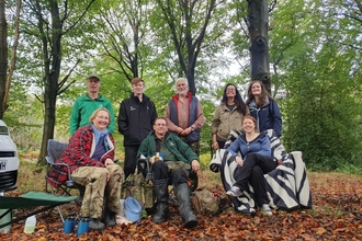 Conservation trainees attending a coppicing workshop